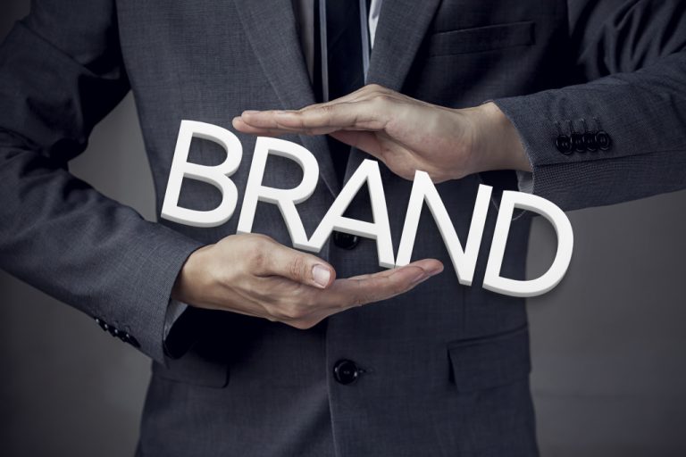 brand in the hands of a person